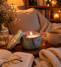 Cozy indoor setting with a lit candle